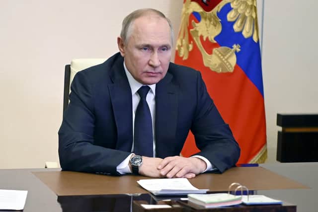 Russian President Vladimir Putin chairs a Security Council meeting yesterday. This was an attack that he had planned for a long time