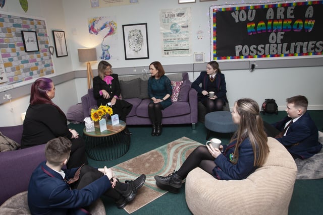 Professor O'Neill in discussion with Ms Aislinn Breslin, Mrs Katrina Crilly, Principal and some of the students during a visit to the Nurture Room..