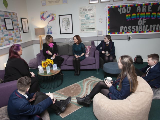Professor O'Neill in discussion with Ms Aislinn Breslin, Mrs Katrina Crilly, Principal and some of the students during a visit to the Nurture Room..