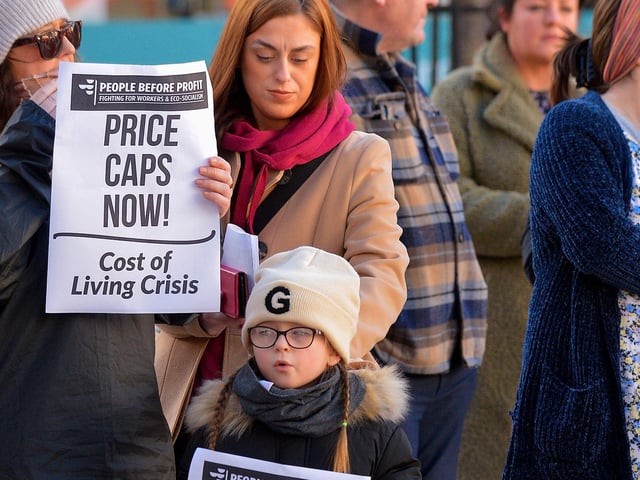 People gather in Waterloo Place for the Derry Against Fuel Poverty protest in Waterloo Square on Saturday afternoon last. Photo: George Sweeney.  DER2209GS – 064