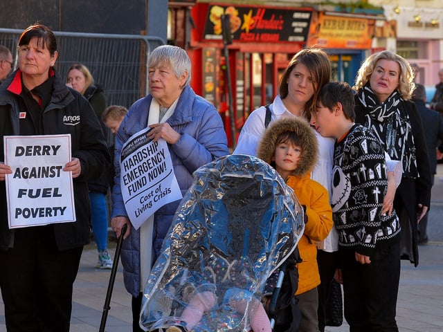 Families attend the Derry Against Fuel Poverty rally in Waterloo Square on Saturday afternoon last. Photo: George Sweeney. DER2209GS – 060