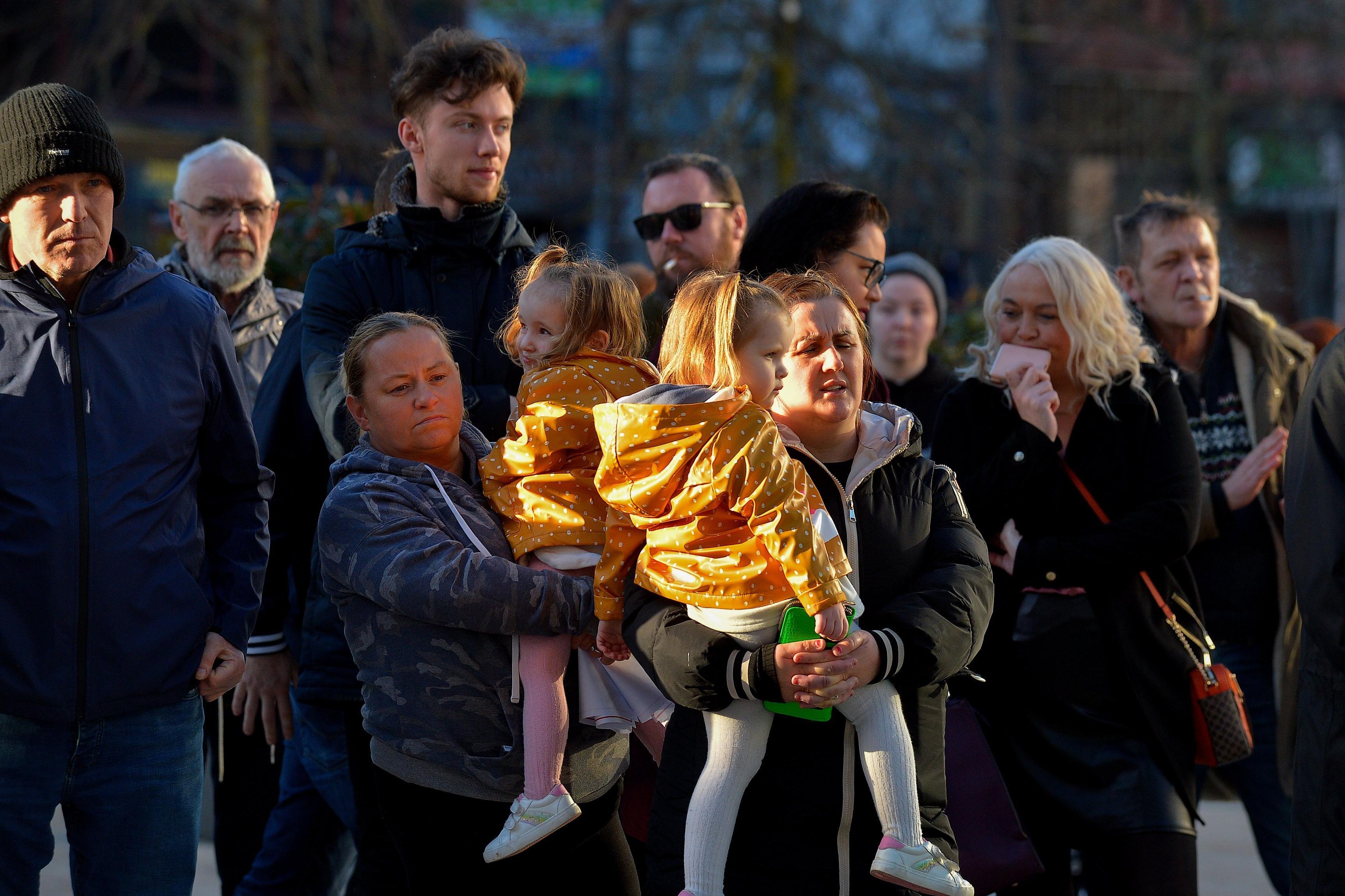 People gather in Waterloo Place for the Derry Against Fuel Poverty protest in Waterloo Square on Saturday afternoon last. Photo: George Sweeney.  DER2209GS – 074