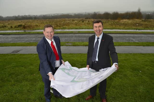 Alderman Mark Cosgrove with Professor Paul Maropolos, director Advanced Manufacturing Innovation Centre reviewing plans for AMIC at Global Point.