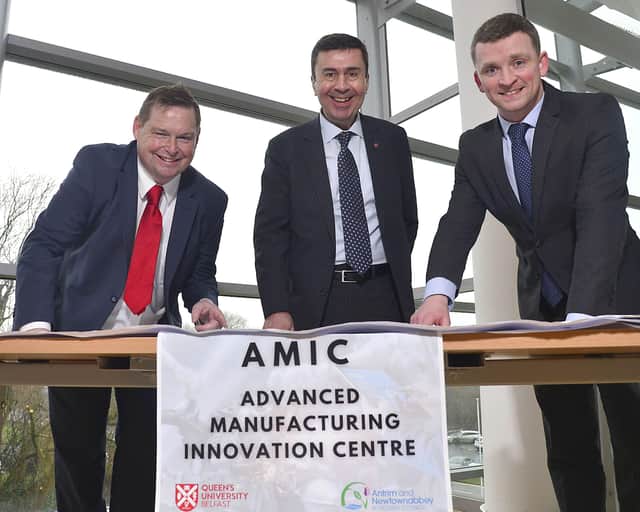 Alderman Mark Cosgrove with Professor Paul Maropolos, director Advanced Manufacturing Innovation Centre and Michael McKenna, Strategic Investment manager reviewing the plans for AMIC at Global Point