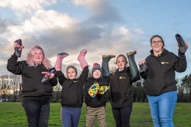 Zoe Gilmore, Beth McConville, Aiden MacDougal, Hannah McConville and Kirstie Greer, members of the Cancer Fund for Children’s Youth Advisory Group prepare for the ‘Mile in My Shoes’ walk at Antrim Castle Gardens on March 19