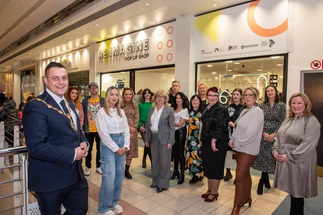 The Mayor Alderman Graham Warke pictured with designers makers, as he offically opened the RE:Imagine pop up shop on Level 3 in Foyleside Shopping Centre