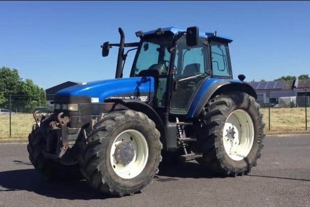 Image of a  New Holland TM165 from tractorsinfo.net