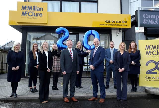 McMillan McClure’s new team of directors Katrina Heaney, Jim McMillan, Barrie McClure and Laura McMillan with staff Janice Holden, Hanna McIlvenny, Laura Gorman, Emma Millar, Cormac McMillan and Laura Ward