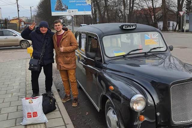Roman Tymchyshyn (left) with one of his passengers travelling across the Polish border. The British-Ukrainian who is helping to evacuate refugees across the Polish border using a London black cab has said he is "doing everything he can". Tymchyshyn, 31, has already transported around 80 people including pregnant women, disabled elderly people, children and even a nine-month-old baby.