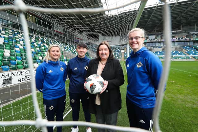 Communities Minister Deirdre Hargey pictured with Nadene Caldwell, Toni Leigh Finnegan and Julie Nelson after announcing that she has made £100,000 available to help promote female sport through football.