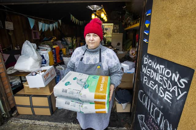 Smokey Deli owner Monika Rawson, who has been living in Northern Ireland for over 16 years since moving from Poland, with some of the donations she has received for Ukraine