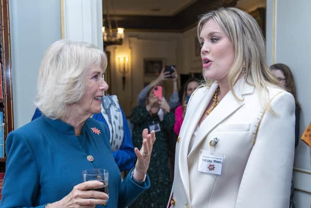 The Duchess of Cornwall (left) as President of WOW - Women of the World Festival, speaks to actress, filmmaker, and writer, Emerald Fennell, during a reception to mark International Women's Day at Clarence House, London. Picture date: Tuesday March 8, 2022.