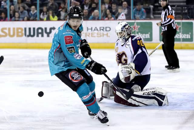 Belfast Giants' Patrick Mullen with Guildford Flames' Travis Fullerton in February 2020. Photo by William Cherry/Presseye
