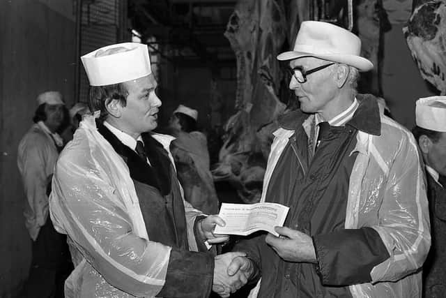 Mr John Kelly, Allied Irish Banks, handing over a sponsorship cheque in March 1981 to Mr David Perry, chairman of the Northern Ireland Simmental Breedersâ€TM Club. Picture: Farming Life/News Letter archives
