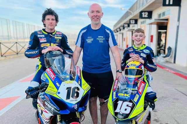 Burrows Engineering/RK Racing team boss John Burrows with Mike Browne and his son Jack during a pre-season test at Cartagena in Spain.