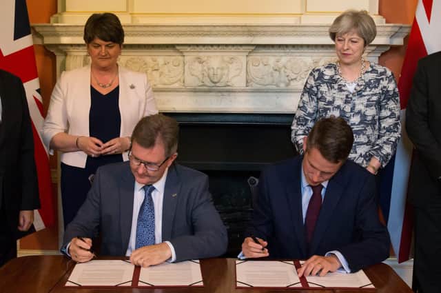 We all remember the picture of Sir Jeffrey (above, centre left, in 2017) signing the ‘confidence and supply’ deal which led to the DUP supporting both the Theresa May and Boris Johnson governments