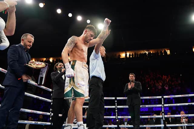 There were muted celebrations from defending champion Leigh Wood amid concern for the wellbeing of Michael Conlan after their WBA Featherweight World Title contest at the Motorpoint Arena, Nottingham. Picture date: Saturday March 12, 2022.