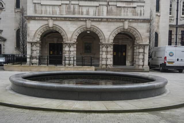 The fountain in the courtyard of Belfast City Hall is a tribute to all of the council workers killed or injured during the Troubles. Photo: Michael Cousins