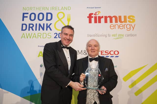 Niall Martindale, interim managing director, firmus energy is pictured with Dr Terry Cross OBE, chairman, Hinch Distillery. Hinch Distillery collected the Small Company Best New Product award for Hinch Whiskey