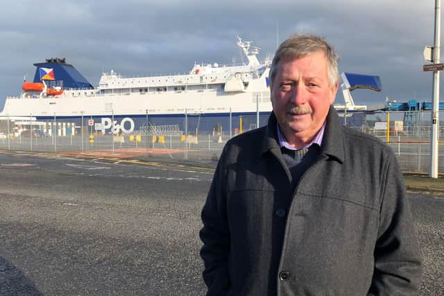 East Antrim MP Sammy Wilson in front of P&O European Causeway ferry docked at Larne Port. Unions were threatening legal action against P&O on Thursday after the ferry giant sacked 800 seafarers and replaced them with cheaper agency workers. Picture date: Thursday March 17, 2022. PA Photo. See PA story SEA Ferries. Photo credit should read: David Young/PA Wire