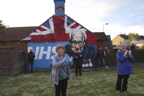 Residents of Clonduff in east Belfast clap for NHS heroes during the early part of the coronavirus pandemic in 2020