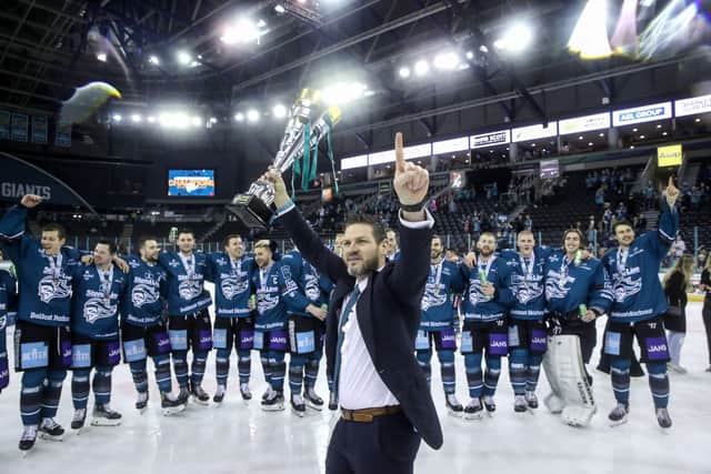 Press Eye - Belfast, Northern Ireland - 16th March 2022 - Photo by William Cherry/Presseye

Belfast Giants coach Adam Keefe celebrate winning the Challenge Cup after defeating the Cardiff Devils in overtime in Wednesday nights Challenge Cup Final at the SSE Arena, Belfast.  Photo by William Cherry/Presseye