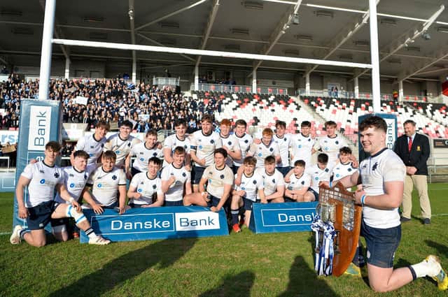Methodist College team pictured with Vicky Davies, Danske Bank Chief Executive, after defeating Campbell College