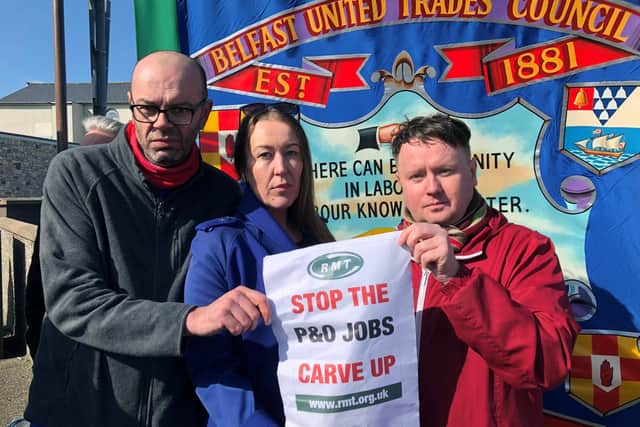 Three sacked P&O crew members, left to right Colin Mansfield, Gail Dowey and Daniel McDonald protest at Larne Port after P&O Ferries suspended sailings and handed 800 seafarers immediate severance notices. Picture: PA Wire/PA images