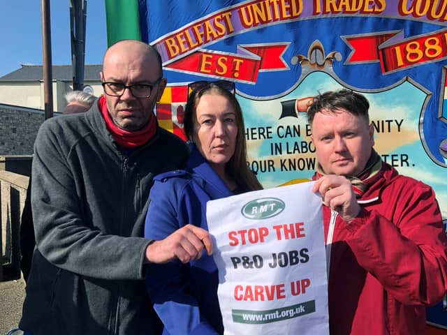 Three sacked P&O crew members, left to right Colin Mansfield, Gail Dowey and Daniel McDonald protest at Larne Port after P&O Ferries suspended sailings and handed 800 seafarers immediate severance notices. Picture: PA Wire/PA images