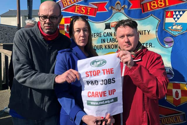 Three sacked P&O crew members, Colin Mansfield, Gail Dowey and Daniel McDonald, protest at Larne Port.