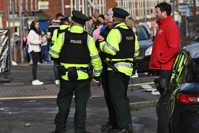 Police, city council and university staff in the Holylands area of south Belfast on St Patrick's Day 2022. 
Photo: Colm Lenaghan/ Pacemaker