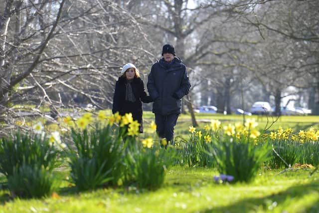 People enjoying a walk on the equinox, the first day of Spring, in Malone House Park in Belfast. It was sunny there as it was across most of Northern Ireland on Sunday, indeed most of the UK. 
Picture by Arthur Allison/Pacemaker Press
