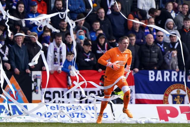 Rangers goalkeeper Allan McGregor surrounded by streamers during the cinch Premiership match at the Kilmac Stadium
