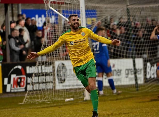 Joe Gormley wheels away after firing Cliftonville in front against Dungannon Swifts