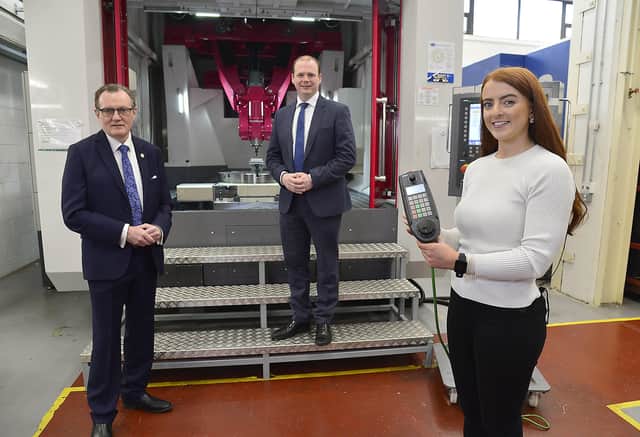 Pictured at the NI Technology Centre at Queen's University Belfast are vice-chancellor of Queen’s University professor Ian Greer, Economy Minister Gordon Lyons and QUB PhD student Lauren McGarry