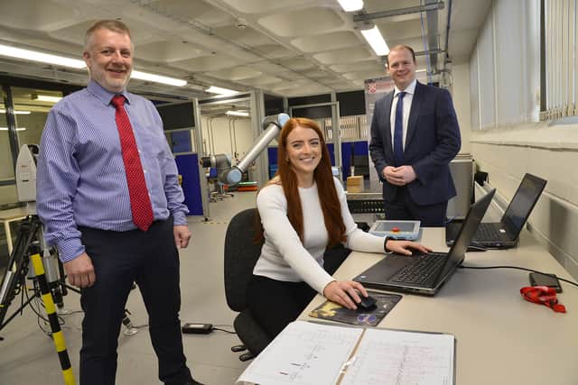 Pictured at the NI Technology Centre at Queen's University Belfast are Colm Higgins, head of the NI Technology Centre, QUB PhD student Lauren McGarry and Economy Minister Gordon Lyons