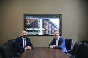 Gary Strain, head of business and sales, Titanic Suites is pictured with Simon Hamilton, CEO of Belfast Chamber