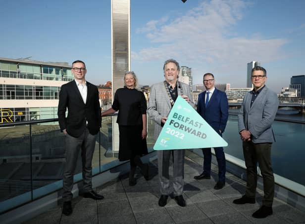 Belfast chamber president Michael Stewart and Belfast chamber chief  executive Simon Hamilton are pictured along with Rob Heron, managing partner at EY, Andrew Carter, chief executive, Centre for Cities and Tina Saaby, City Architect of Gladsaxe and former City Architect of Copenhagen at the BelFastForward 2022