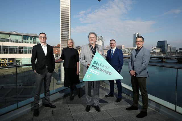 Belfast chamber president Michael Stewart and Belfast chamber chief  executive Simon Hamilton are pictured along with Rob Heron, managing partner at EY, Andrew Carter, chief executive, Centre for Cities and Tina Saaby, City Architect of Gladsaxe and former City Architect of Copenhagen at the BelFastForward 2022