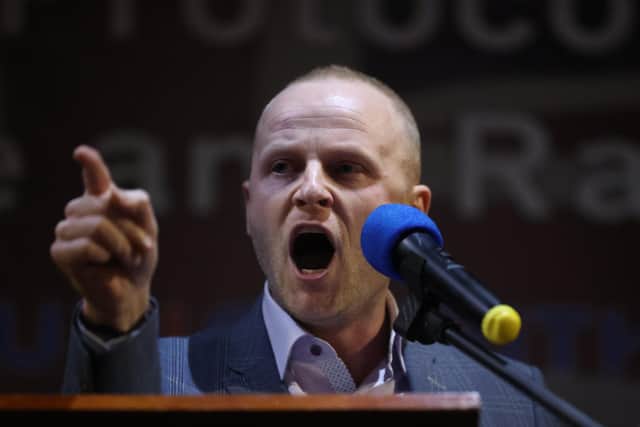 Loyalist blogger Jamie Bryson speaks during an anti-Northern Ireland Protocol rally and parade, organised by North Antrim Amalgamated Orange Committee, in Ballymoney, Co Antrim on Friday March 25, 2022.