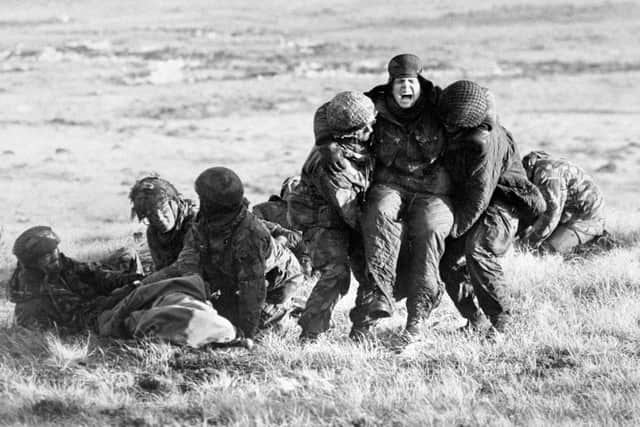 File photo dated 04/06/82 of British paratroopers carrying out emergency medical treatment on wounded comrades whilst under fire on Mount Longdon during the Falklands campaign. A series of lectures, memorials, exhibitions and other events will be launched in the coming days to mark the 40th anniversary of the end of the Falklands War. The aim is to commemorate the sacrifices made in 1982 and to celebrate the progress made in the islands in the South Atlantic over the past 40 years. Issue date: Sunday March 27, 2022.
