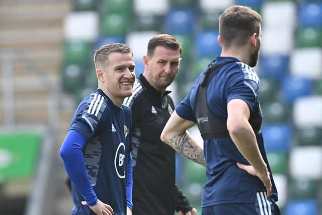 Steven Davis (left) enjoying Northern Ireland training before facing Hungary. Pic by Pacemaker.