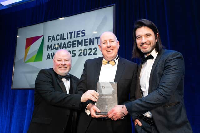 Collecting the FM Workspace Transformation Award from Les Sheridan is Mount Charles’ chief operations officer Jonathan Mallon and Gavin Annon sales and marketing director