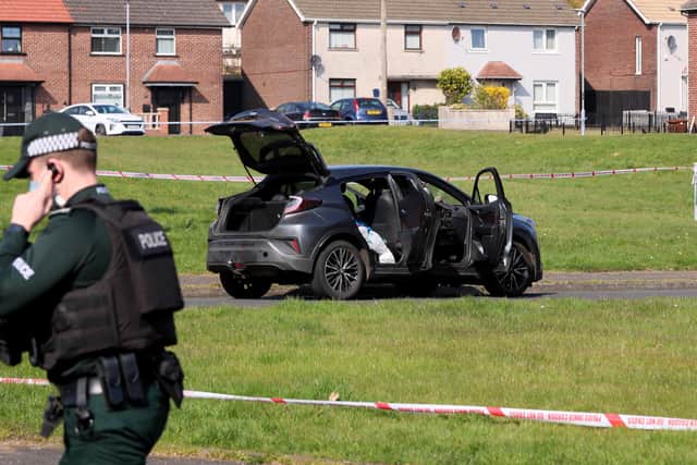 The scene at the Derrycoole Way area of Rathcoole, Co. Antrim, after police arrested two murder suspects on Monday morning. 

Picture:  Jonathan Porter/PressEye