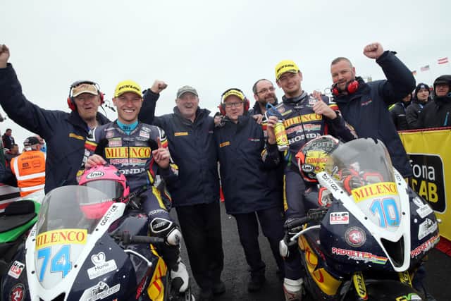 Davey Todd celebrates his Supersport victory at the North West 200 in 2019 with team-mate Conor Cummins, who finished third.