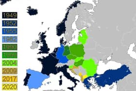 Map of NATO expansion from Wikipedia (credit: Patrickneil + Glentamara)