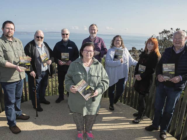 Nic Wright, Museums Engagement Officer at Causeway Coast and Glens Borough Council (left), pictured at Portaneevy Viewpoint outside Ballintoy with community volunteers who participated in the ‘Moyle Migrations’ project