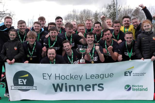 Lisnagarvey celebrate title success in the EY Hockey League. Pic by Pacemaker.