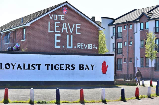 Pro-Brexit graffiti in the loyalist-dominated Tiger’s Bay district of north Belfast in 2016; Sir Reg argues that the potential for Brexit to cause problems for NI were obvious to politicians at the time