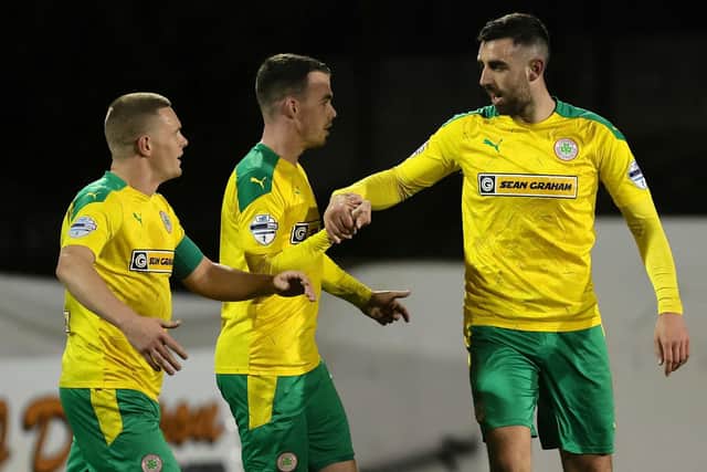 Joe Gormley celebrates his second goal with Levi Ives and Chris Gallagher
